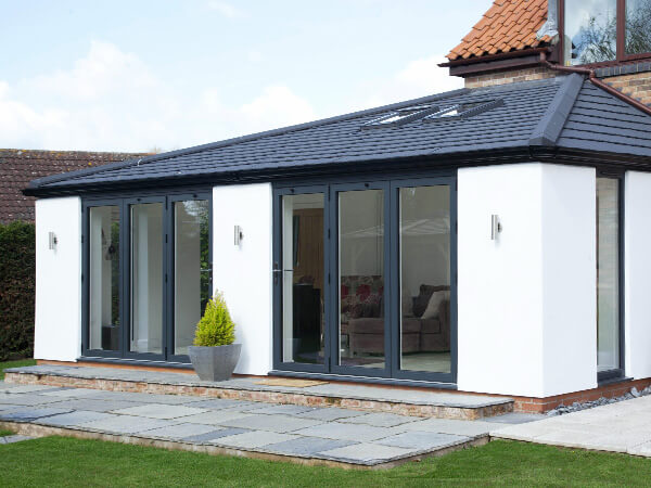 Living space with bi-folding doors and roof windows